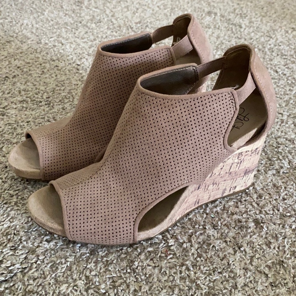 Comfy yet cute cork wedge.
